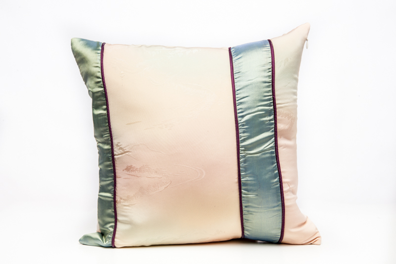 Suzume peach and green boho style cushion